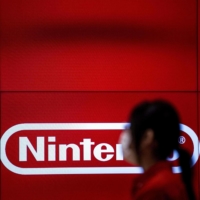 An employee in a Nintendo store in Tokyo | AFP-JIJI