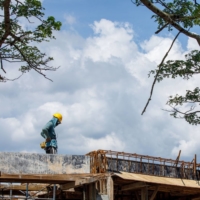A worker at a construction site in Selangor, Malaysia, in May | BLOOMBERG